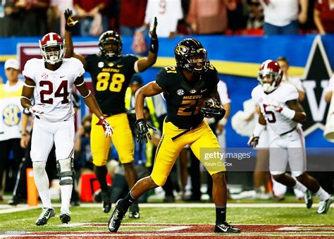 Bud Sasser Of The Missouri Tigers Scores A Touchdown Against The