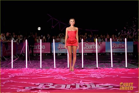 Margot Robbie Changes Into Red Minidress For Barbie Vip Photocall