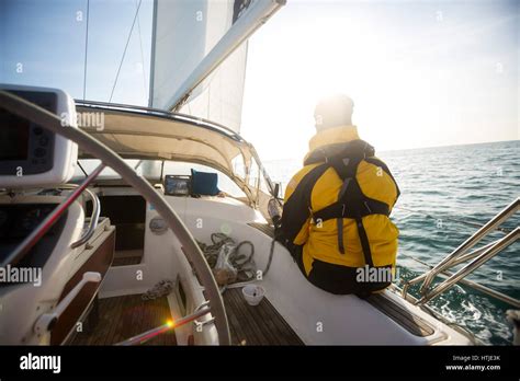 Relaxed Mature Man Sailing On Yacht Stock Photo Alamy