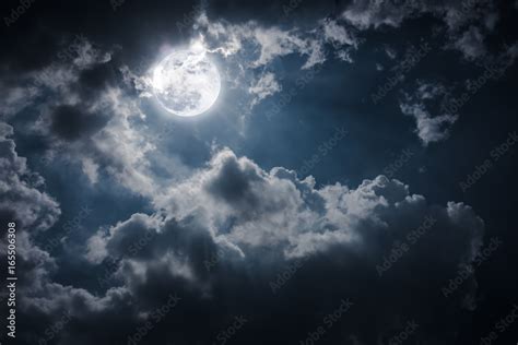 Night landscape of sky with cloudy and bright full moon with shiny ...