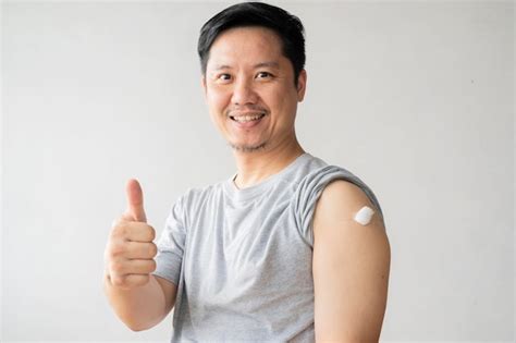 Premium Photo Portrait Of A Man Smiling After Getting A Vaccine