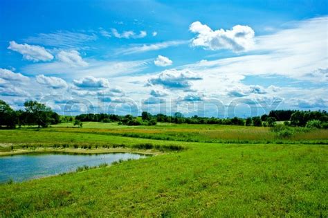 Teich In Einer Landschaft Stock Bild Colourbox