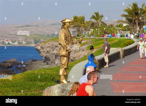 Human Statue Street Performer On Paseo De Meloneras Sea Promenade At