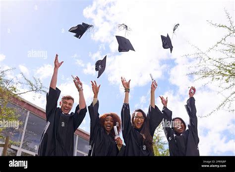 Reason To Celebrate Low Angle Shot Of Student Throwing Their