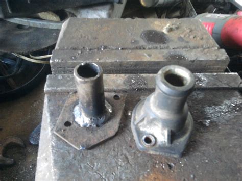 фланец системы охлаждения — Audi 100 (C3), 1,8 л, 1986 года | своими ...