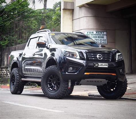 Nissan Frontier Equipped With A Fabtech Lift Kit Artofit