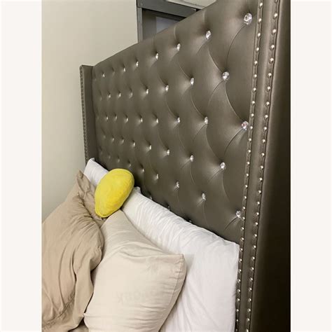 Ashley Queen Upholstered Bed Frame - AptDeco