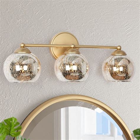 This 3 Light Gold Bathroom Light With Mercury Polished Glass Shades