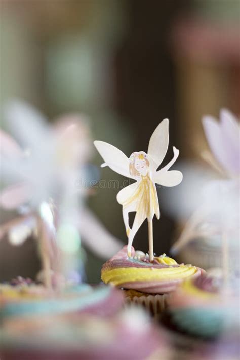Fairy Made With Paper As A Decoration On A Colourful Sugar Pastry Stock