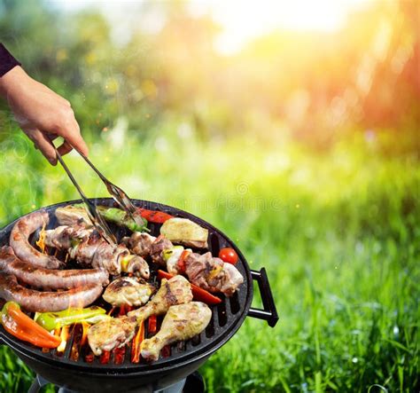 Picnic In Countryside Barbecue Grill With Vegetable Stock Photo