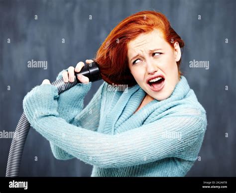 Not The Best Way To Clean Your Hair A Young Redhead With Her Hair