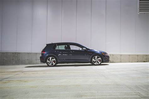 Download Side View Of Blue Volkswagen Golf Gti Wallpaper