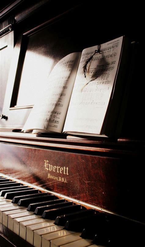 An Old Piano With Sheet Music On It