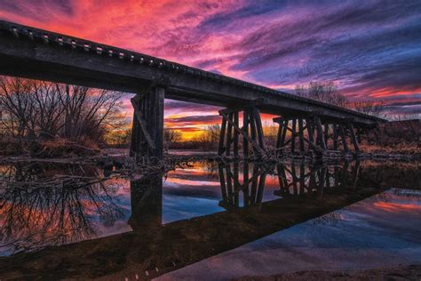 Reflected Railroad Trestle At - Canvas Art Print | Christopher Thomas