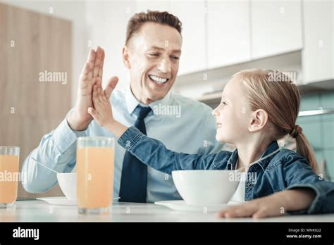 Joyful Brunette Looking At His Kid Stock Photo Alamy