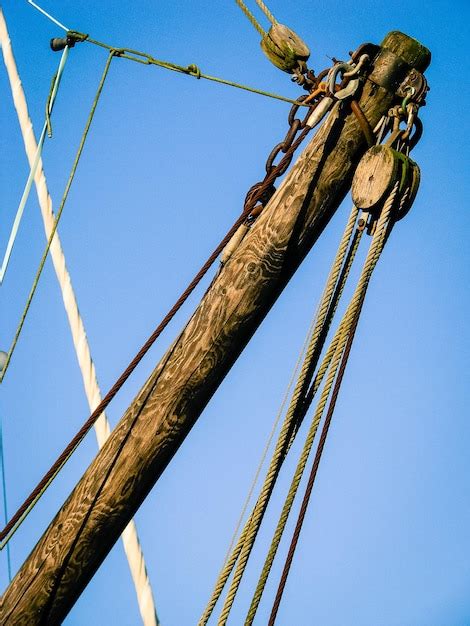 Premium Photo Low Angle View Of Wind Turbine Against Blue Sky