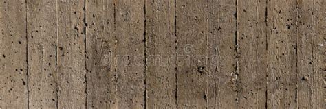 Wooden Imprint From Formwork In Concrete Wall For Background Stock