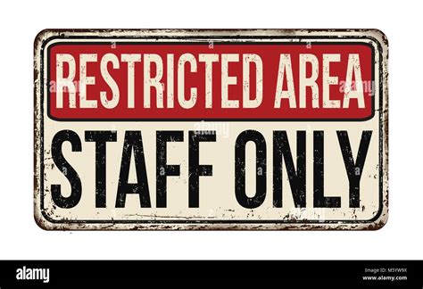 Restricted Area Staff Only Vintage Rusty Metal Sign On A White