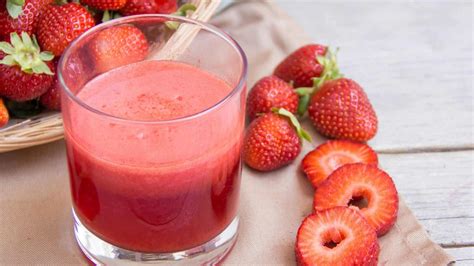 Glass Of Fresh Strawberry Juice Isolated On White Stock Photo By