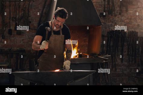 Hammer Yourself Until You Find Your Passion A Metal Worker Hitting A Hot Metal Rod With A