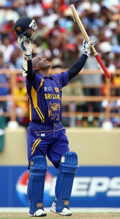 Sanath Jayasuriya looks skywards after reaching his century ...