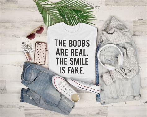 The Boobs Are Real The Smile Is Fake Svg Cut Files Cricut Etsy