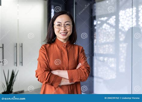 Portrait Of A Young Successful And Confident Asian Female Programmer