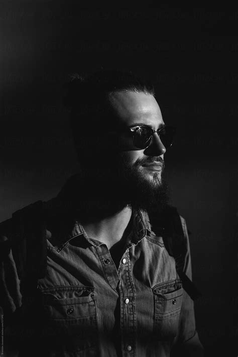 Black And White Portrait Of Young Man Wearing Sunglasses Del Colaborador De Stocksy B