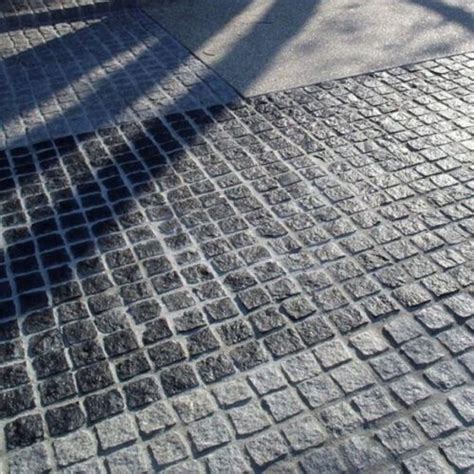 Midnight Natural Split Black Cobblestones On Mesh Sheets Australia S