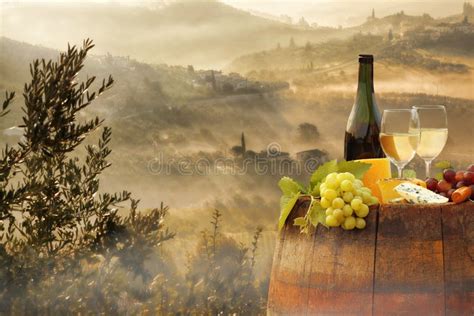 White Wine With Barrel On Famous Vineyard In Chianti Tuscany Italy