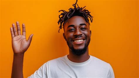 Premium Photo Happy African American Man With Dreadlocks Waving Hand