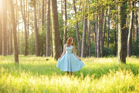 Beautiful Young Woman Wearing Elegant Light Blue Dress Standing In The