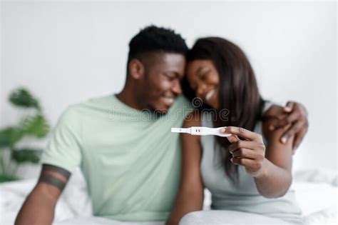 Smiling Millennial African American Male And Female Rejoice And Show