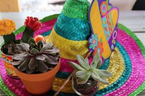 A Sombrero Centerpiece Decked Up With Succulents Mexican Party Theme