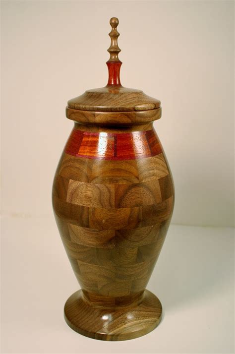 This Hand Crafted Segmented Wooden Urn Is Made Of Butter Nut Purple