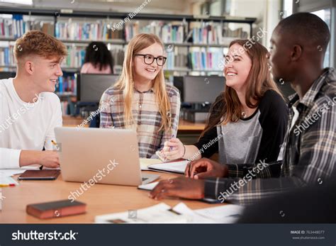 Group College Students Collaborating On Project Stock Photo 763448077