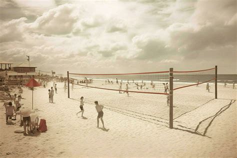 A beach volleyball game in progress 30622380 Stock Photo at Vecteezy