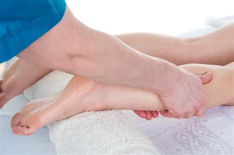 A Professional Massage Therapist Male Manual Massages And Stretches The