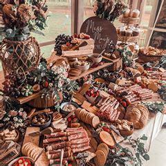 A Table Filled With Lots Of Different Types Of Food And Desserts On Top