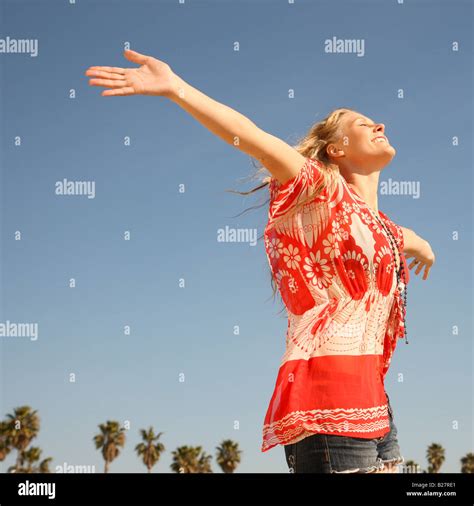 Woman Arms Outstretched Sun Hi Res Stock Photography And Images Alamy