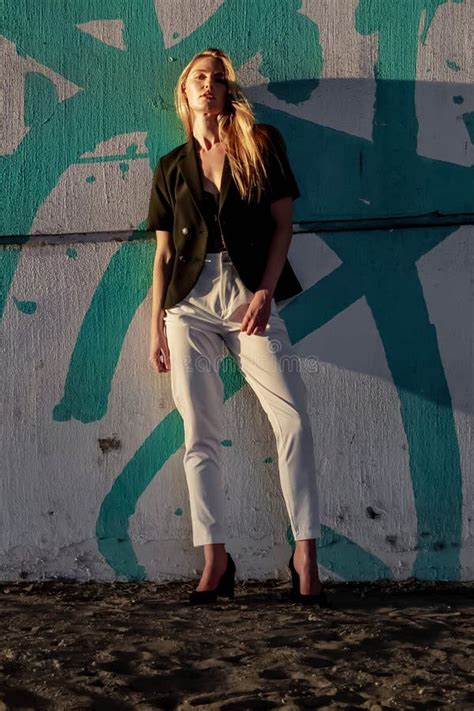 A Lovely Blonde Model Enjoys The Summer Weather In An Urban Environment Stock Image Image Of