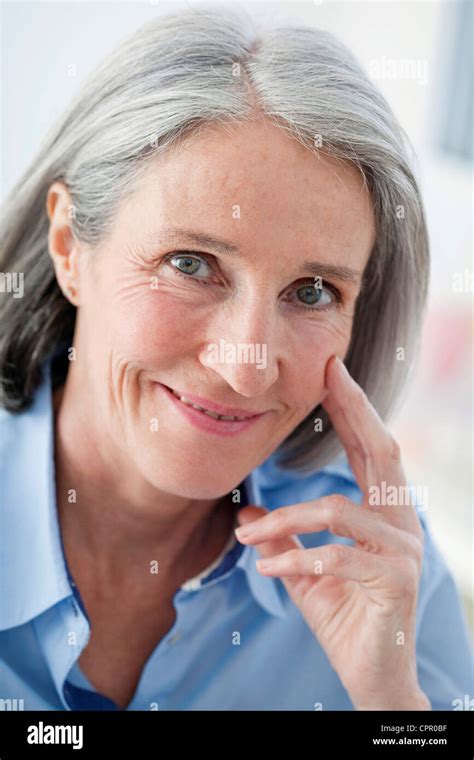 Portrait Of 65 Yr Old Woman Stock Photo Alamy