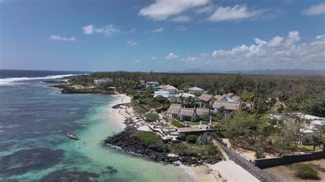 Luxury Villas And A Boat By The Shore Mauritius Aerial View 24693705