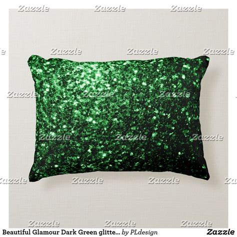 A Green Glitter Pillow Sitting On Top Of A White Wall