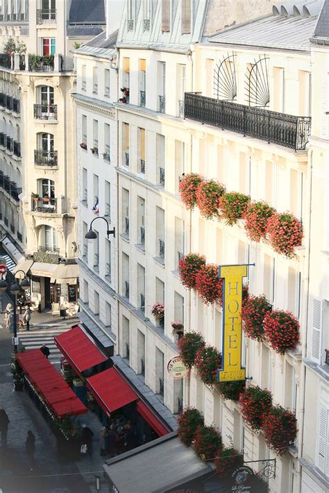 Rue Cler, Picturesque Parisian Street Near The Eiffel Tower