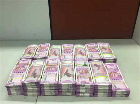 Noida I T Officials Raid Premises Of Former Ips Officer Cash Worth Several Hundred Crores