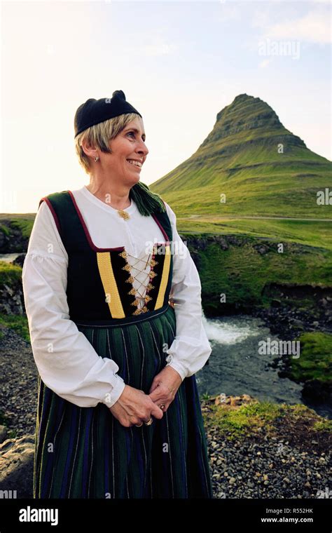 A local Icelandic woman wearing Upphlutur traditional national dress at ...