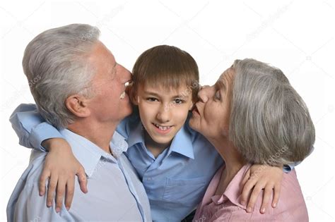 Grandparents kissing grandson Stock Photo by ©aletia 50922201