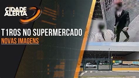 CÂMERA MOSTRA LADRÃO ENGRAVATADO RENDENDO FUNCIONÁRIA DE SUPERMERCADO