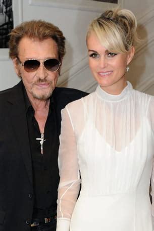 Johnny Hallyday papa adoptif à 61 et 65 ans